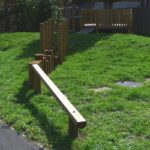 Inclined balance beam for children's adventure trail playground