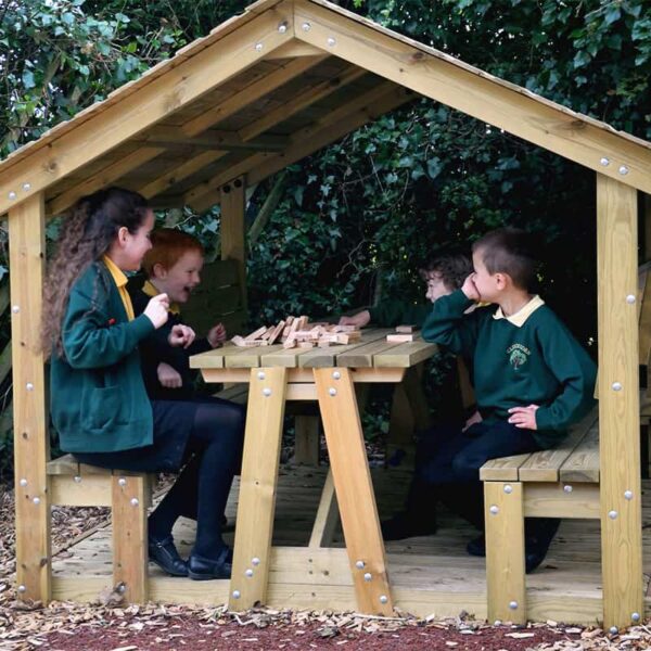 Children Playing In Roofed Seat with Table and Base