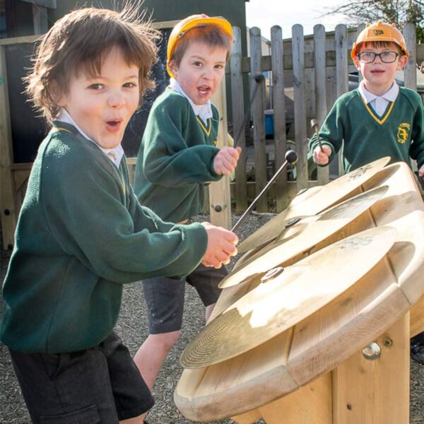 Children hitting the cymbals with sticks