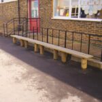 Post-Mounted Timber Bench In A Straight Line