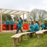 Children Playing On Amphitheatre Seating