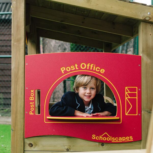 Boy Playing In Playtime Shop Post Office