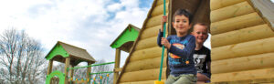 Children playing on Schoolscapes tower play equipment