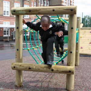 Child climbing through the rope tunnel