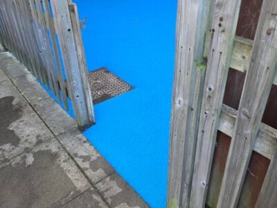 Blue wet pour safety surfacing at Kent primary school