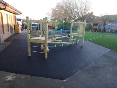 Climbing frame and safety surfacing