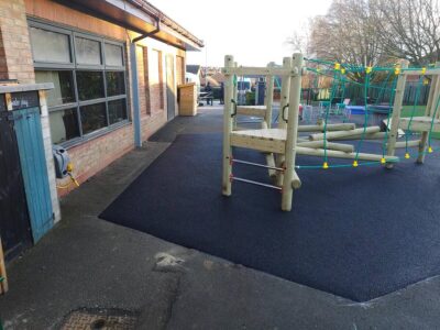 Climbing frame and safety surfacing
