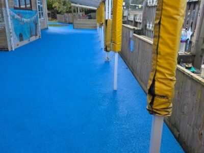 Wet pour rubber surfacing